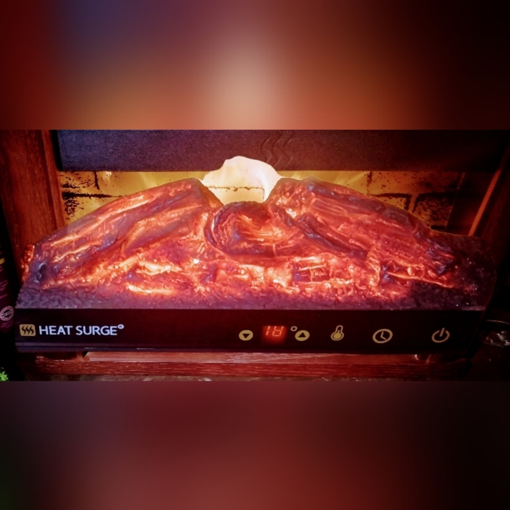 New Heat Surge Mini Glo Heater
